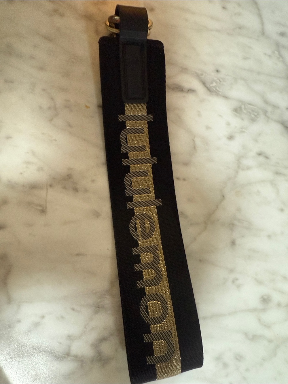 Lululemon Gold-Accented Black Logo Wrist Strap